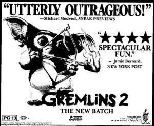 GREMLINS 2 THE NEW BATCH- Newspaper ad. July 30, 1990. Caped Wonder Stuns City!