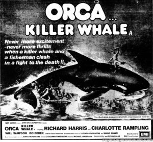 ORCA THE KILLER WHALE- Newspaper ad (UK). July 29, 1977. Caped Wonder Stuns City!