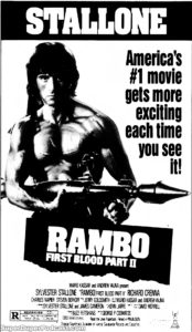 RAMBO FIRST BLOOD PART II- Newspaper ad. July 30, 1985. Caped Wonder Stuns City!