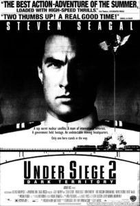 UNDER SIEGE 2 DARK TERRITORY- Newspaper ad. July 29, 1995. Caped Wonder Stuns City!