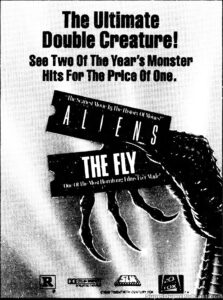 ALIENS/THE FLY- Newspaper ad. November 1, 1986. Caped Wonder Stuns City!