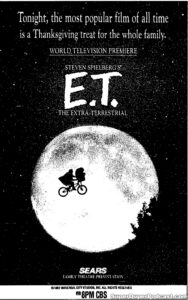 ET THE EXTRATERRESTRIAL- Television guide ad. November 28, 1991. Caped Wonder Stuns City!